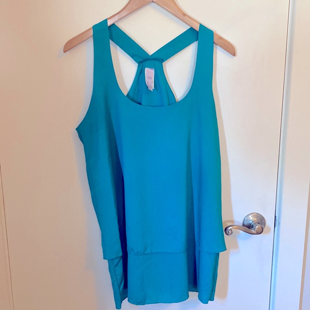 Green sleeveless blouse